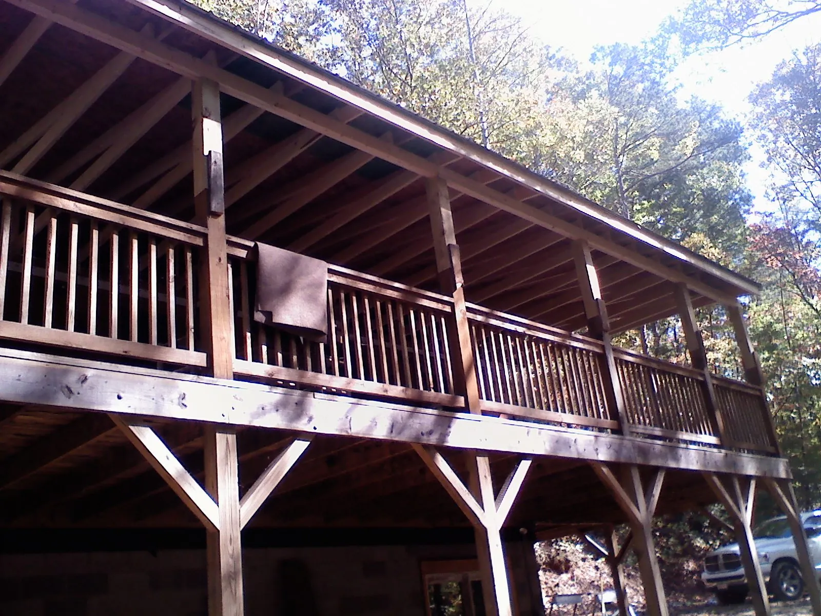 Timber framing under a new elevated porch and deck — Roof Leak Repair in New Concord by Roofing Brothers